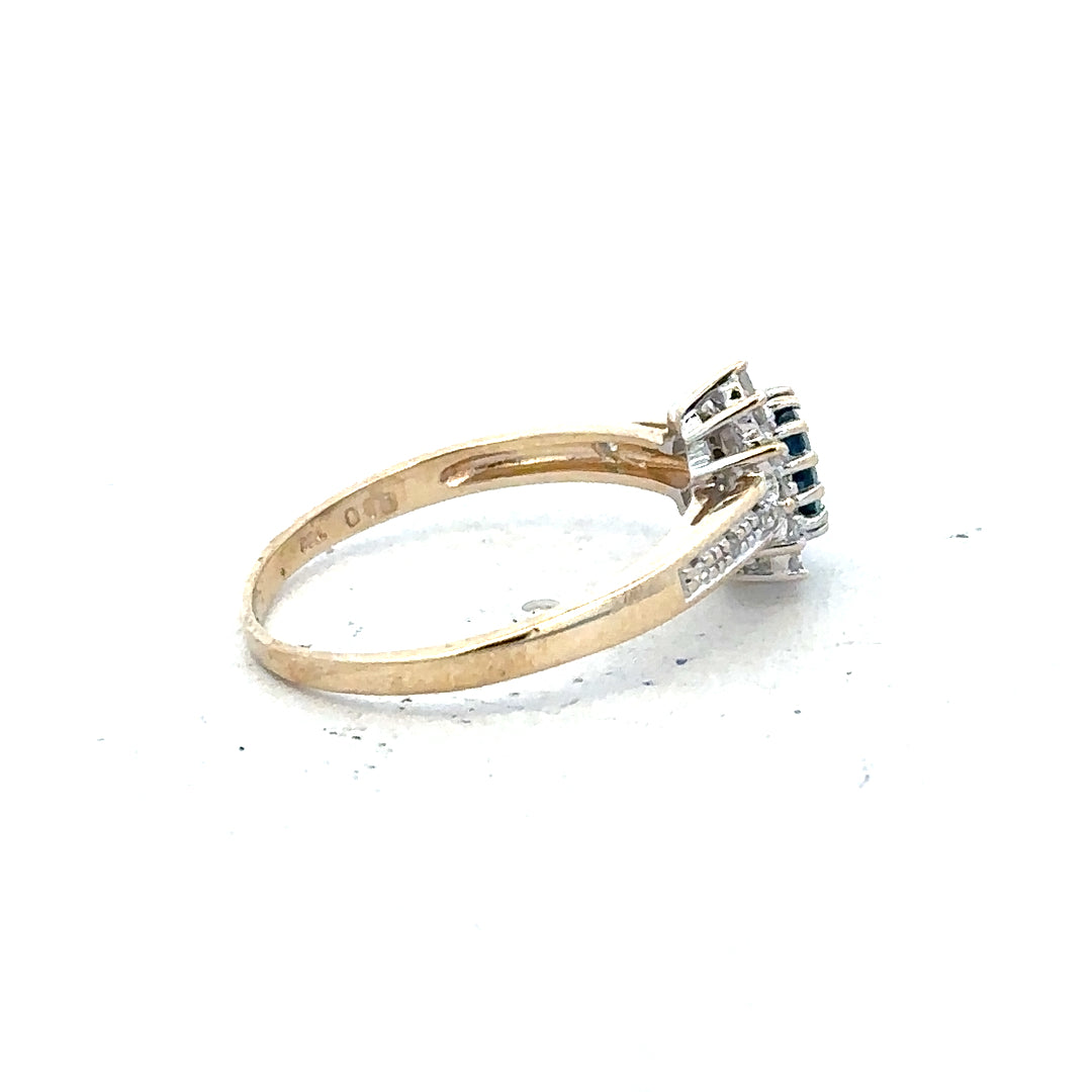 9ct yellow gold sapphire and diamond ring, size P1/2, featuring a sparkling gemstone and elegant design.
