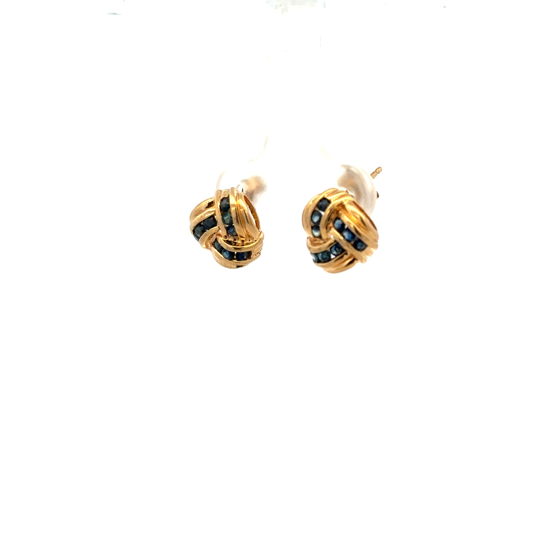 9ct yellow gold sapphire earrings with a simple stud design, featuring deep blue sapphires set in 9-carat gold.