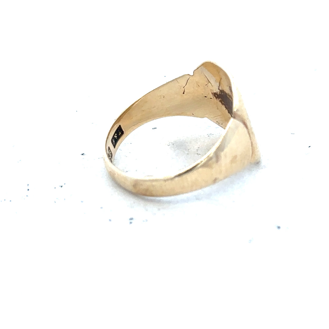 9ct yellow gold signet ring in size J with a smooth polished surface, unbranded jewelry design.