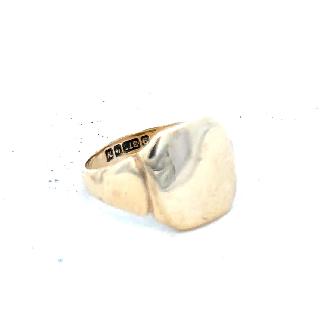 9ct yellow gold signet ring in size J with a smooth, polished finish, unbranded jewelry for men or women.