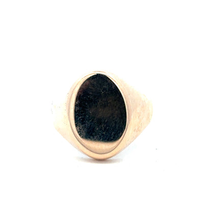 Unbranded 9ct yellow gold signet ring in size S1/2, showcasing a smooth, polished surface and classic design.