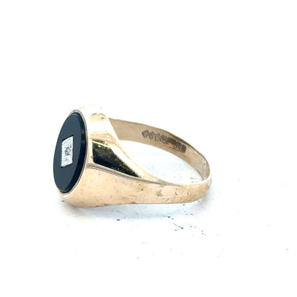 9ct yellow gold signet ring in size T, unbranded, featuring a smooth, polished surface and classic design.