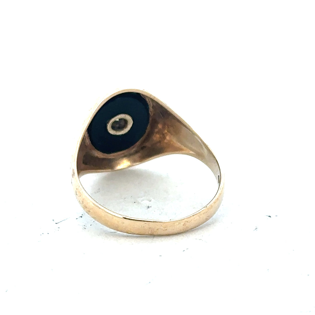 9ct yellow gold signet ring in size T, unbranded, with a smooth polished surface and classic rectangular face.