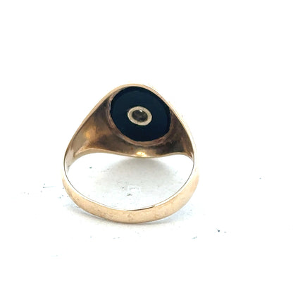9ct yellow gold signet ring in size T with a smooth polished finish, unbranded, showcasing classic jewelry style.