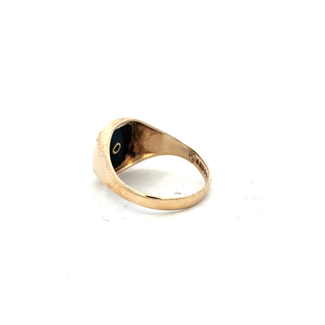 9ct yellow gold signet ring in size X, unbranded, featuring a smooth polished surface and classic design.