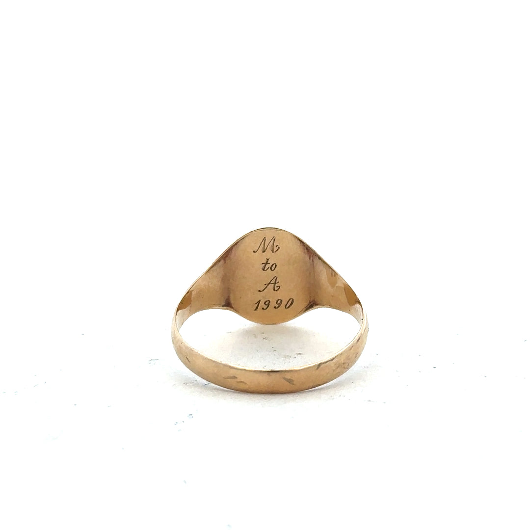 9ct yellow gold signet ring in size Y, featuring a smooth polished surface and classic design, unbranded jewelry.