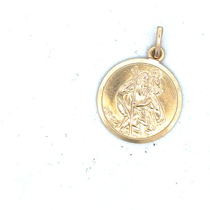 9ct yellow gold St Christopher pendant, unbranded, weighing 3.1g, featuring detailed religious medal design.