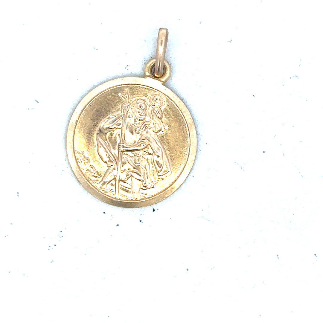 9ct yellow gold St Christopher pendant weighing 3.1g, unbranded jewelry accessory featuring detailed religious symbol.