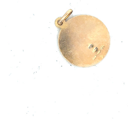 9ct yellow gold St Christopher pendant, unbranded, weighing 3.1g, featuring religious charm with detailed design.