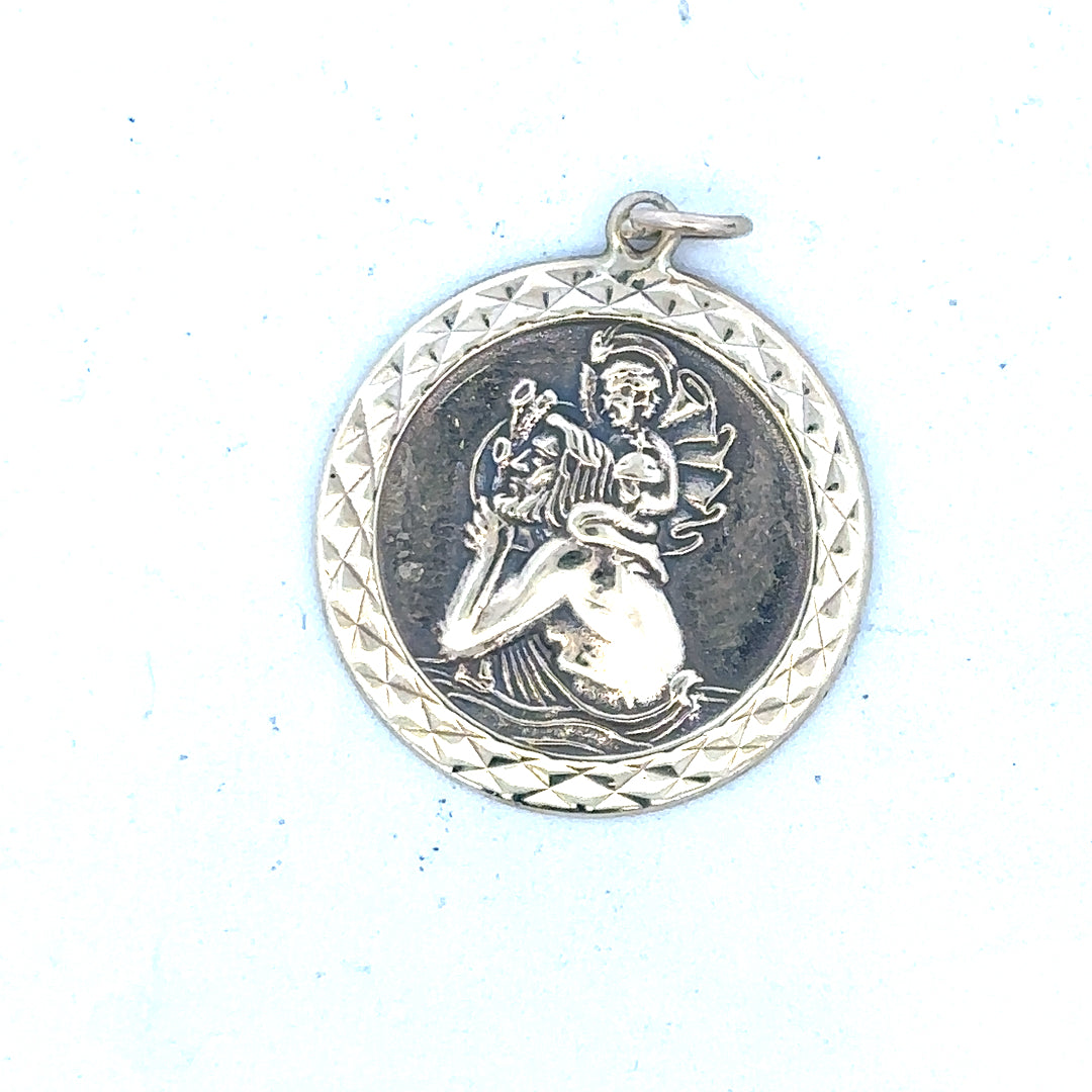 9ct yellow gold St Christopher pendant, unbranded, weighing 4.9g with detailed religious design.