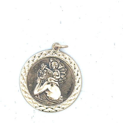 9ct yellow gold St Christopher pendant with detailed religious iconography, weighs 4.9g, unbranded jewelry accessory.