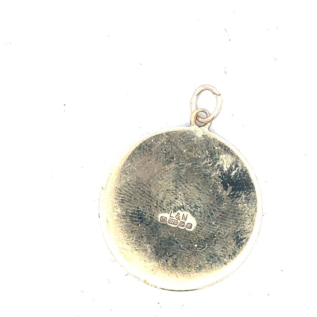 9ct yellow gold St Christopher pendant, unbranded, weighing 4.9g, detailed religious jewelry pendant with intricate design.