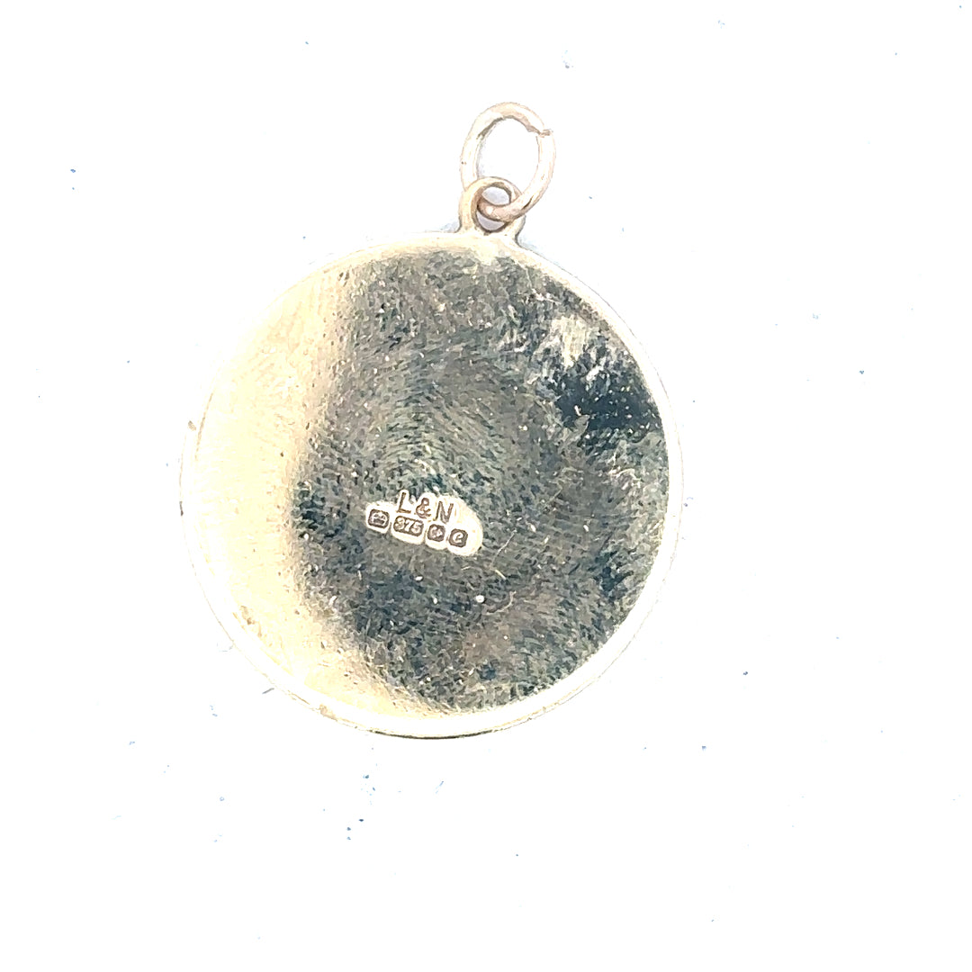 9ct yellow gold St Christopher pendant, unbranded, weighing 4.9g, featuring detailed religious medal jewelry.