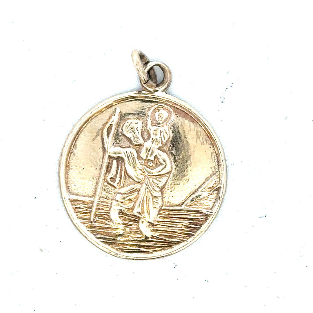 9ct yellow gold St. Christopher pendant with religious design, weighs 5.7g, unbranded jewelry accessory.