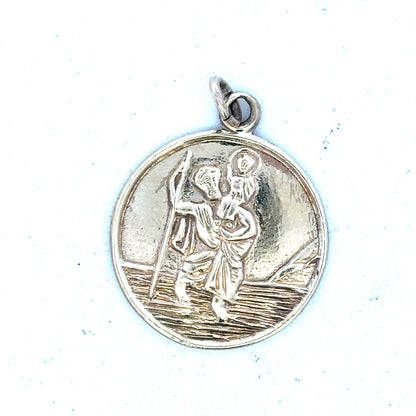 9ct yellow gold St. Christopher pendant, unbranded, featuring detailed religious design, weighs 5.7g, ideal for necklaces.