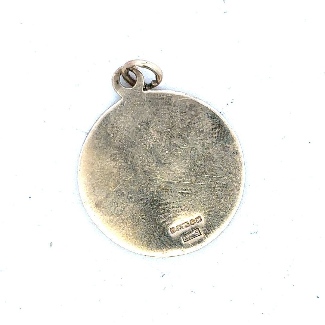 9ct yellow gold St. Christopher pendant, unbranded, showcasing detailed religious pendant design with a total weight of 5.7g.