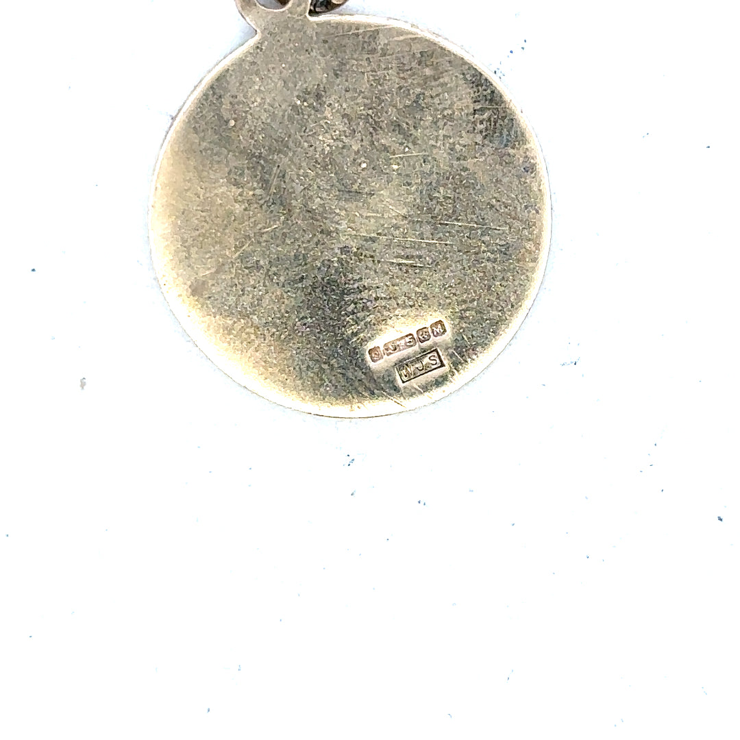 9ct yellow gold St. Christopher pendant showing detailed religious medal with loop for chain, weighs 5.7 grams.