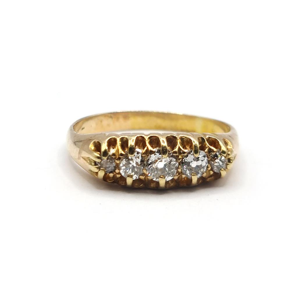 Antique 18ct yellow gold ring with five old cut diamonds totaling 0.57 carats, showcasing vintage elegance and craftsmanship.