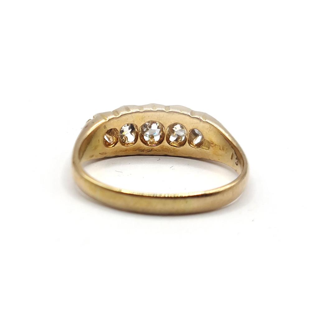 Antique 18ct yellow gold ring with five old cut diamonds totaling 0.57 carats, showcasing vintage elegance and craftsmanship.