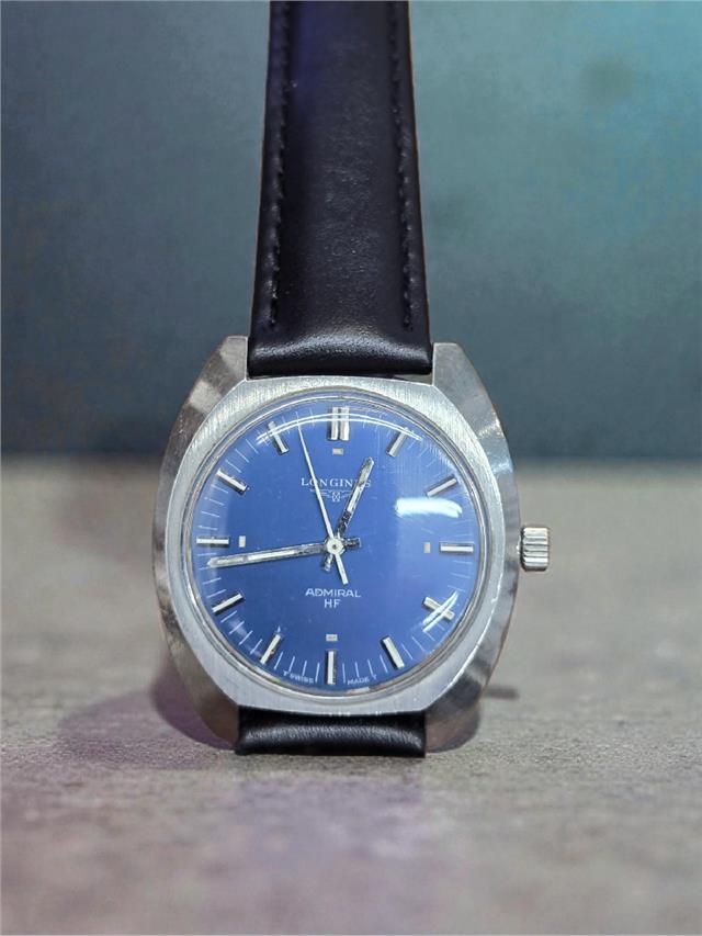 Longines 1972 Munich Olympics watch with stainless steel case and classic dial, displayed on a white background.