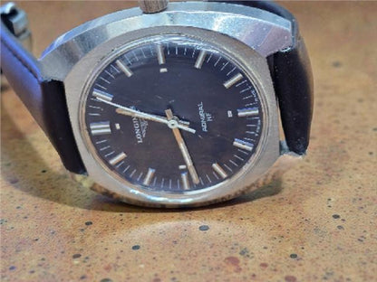 Longines 1972 Munich Olympics watch with stainless steel band and vintage dial, classic unbranded sports watch.