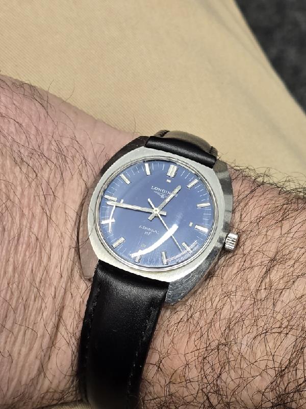 Longines 1972 Munich Olympics watch showing the dial and case, featuring vintage design and Olympic branding on the face.