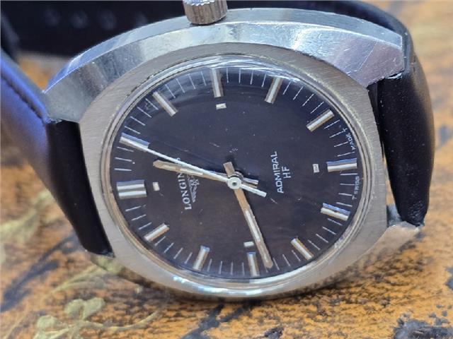 Unbranded Longines 1972 Munich Olympics watch with gold-tone case and vintage dial, showcasing Olympic logo and classic design.