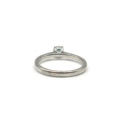 Platinum 0.26 carat diamond solitaire ring featuring a single sparkling diamond set on a sleek platinum band.
