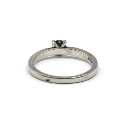 Platinum solitaire diamond ring with a 0.30 carat brilliant cut diamond, displayed on a plain background.