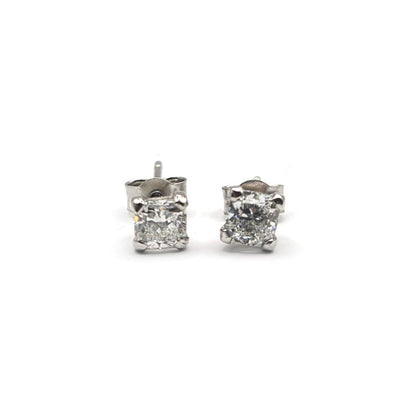 Platinum diamond stud earrings with 1.00 carat GIA certified diamonds, color G, clarity VS2, featuring classic round design.