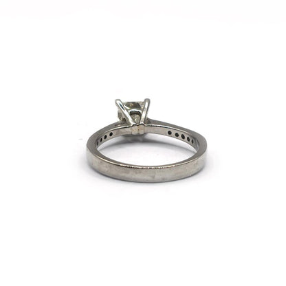 Platinum 1.00 carat princess cut diamond ring with a sleek, modern design and sparkling center stone.