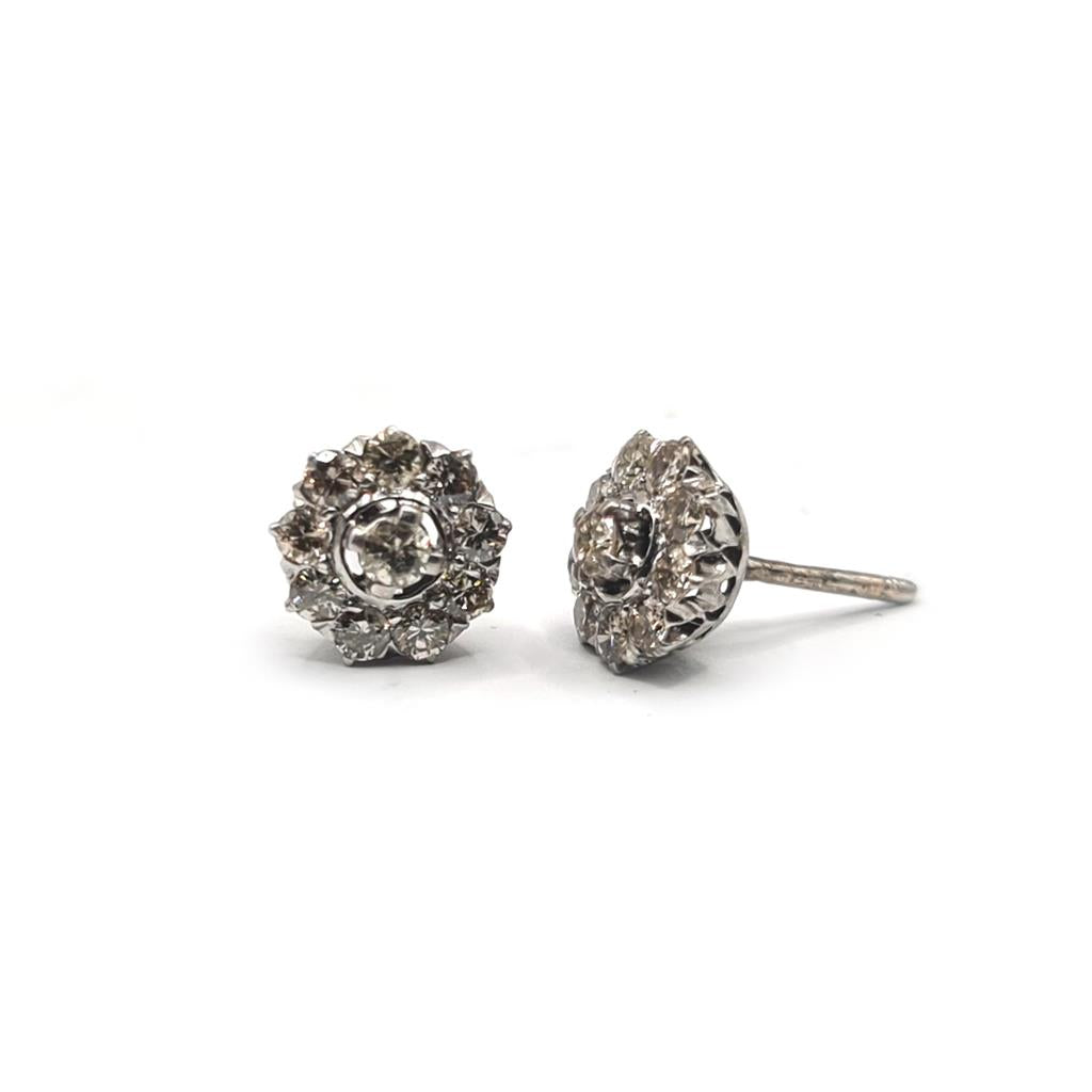 Platinum 1.40 carat diamond stud earrings with round-cut diamonds and a classic setting, unbranded jewelry image.