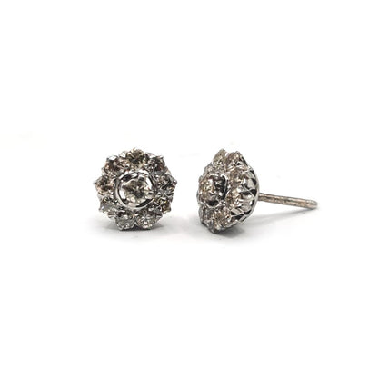 Platinum 1.40 carat diamond stud earrings with round-cut diamonds and a classic setting, unbranded jewelry image.