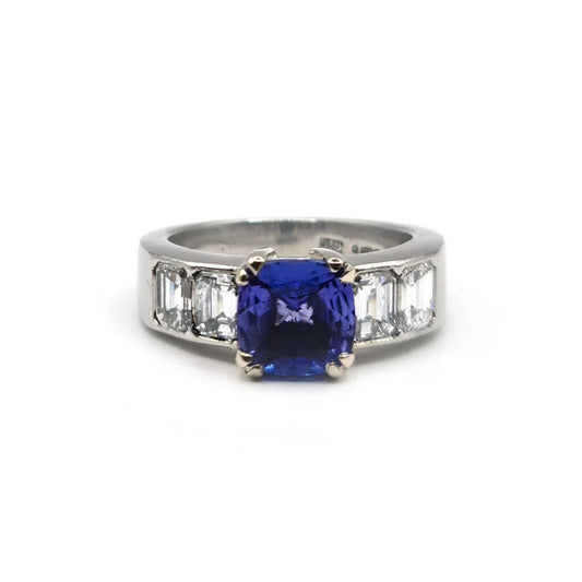 Platinum ring with a 1.79 carat tanzanite center stone surrounded by 1.60 carat diamonds, unbranded jewelry.