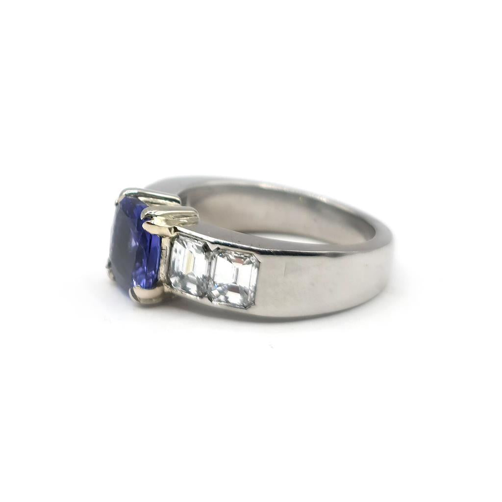 Platinum ring with a 1.79 carat tanzanite center stone and 1.60 carat diamond accents, elegant jewelry design.