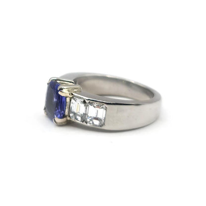 Platinum ring featuring a 1.79 carat tanzanite gemstone and 1.60 carat diamonds, elegant jewelry with intricate detailing.