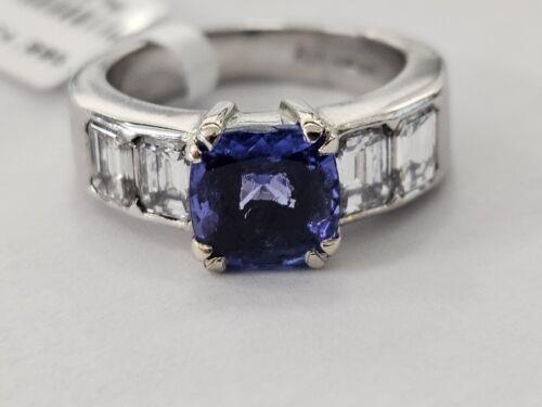 Platinum ring featuring a 1.79 carat tanzanite gemstone and 1.60 carat diamonds, elegant jewelry with sparkling stones.