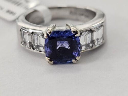 Platinum ring featuring a 1.79 carat tanzanite gemstone and 1.60 carat diamonds, elegant jewelry with sparkling stones.