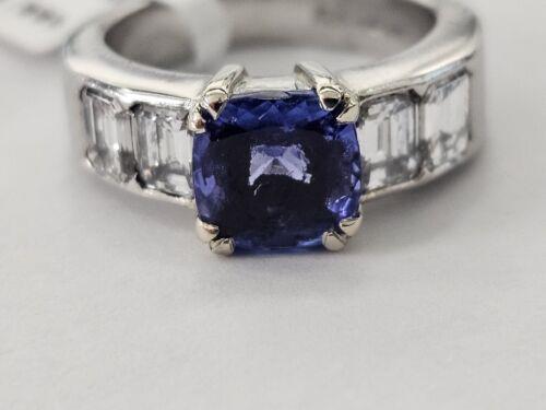 Platinum ring featuring a 1.79-carat tanzanite gemstone and 1.60-carat diamonds, showcasing elegant jewelry craftsmanship.