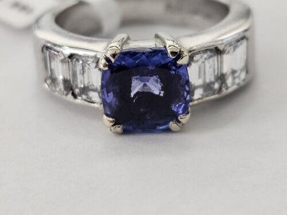 Platinum ring featuring a 1.79-carat tanzanite gemstone and 1.60-carat diamonds, showcasing elegant jewelry craftsmanship.
