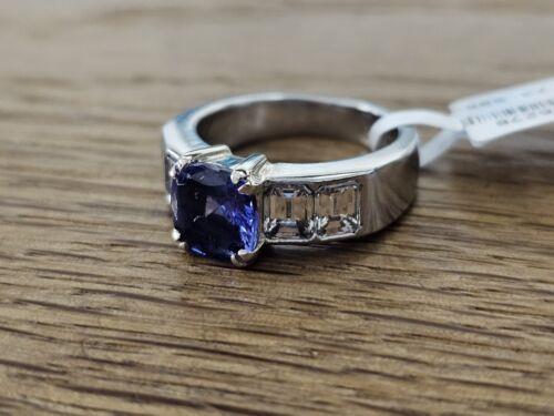Platinum ring featuring a 1.79-carat tanzanite gemstone and 1.60-carat diamonds, showcasing elegant jewelry design.