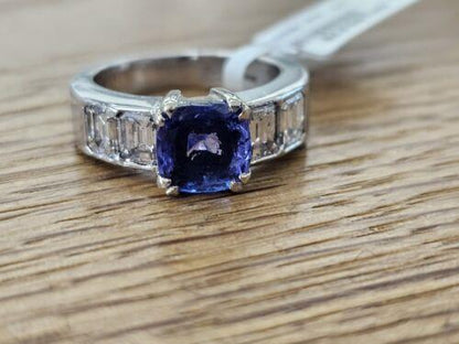 Platinum ring featuring a 1.79 carat tanzanite gemstone and 1.60 carat diamond accents, elegant jewelry accessory.