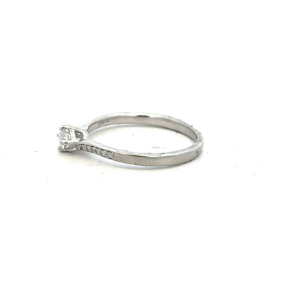 Platinum diamond ring with a complete box set, size small, featuring a sparkling diamond band and elegant packaging.