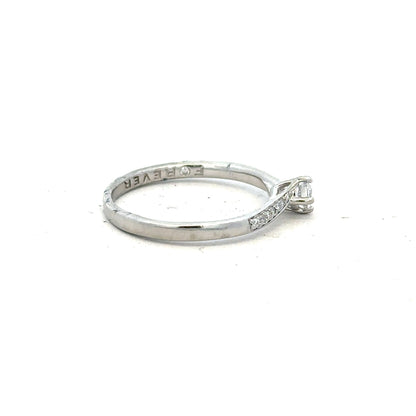 Platinum diamond ring with a complete box set, size small, featuring a sparkling diamond and elegant band.