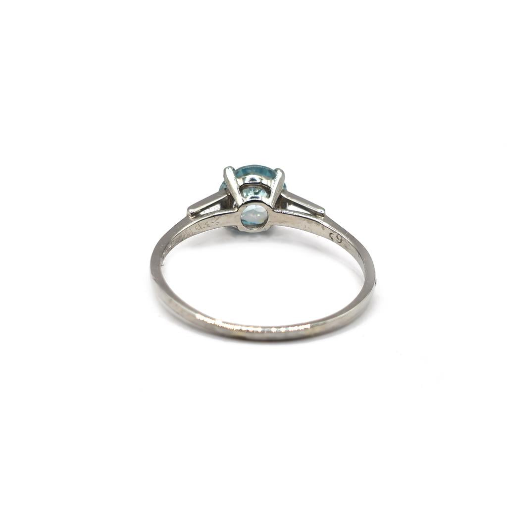 Platinum Topaz and cubic zirconia ring featuring a sparkling gemstone and elegant band design.