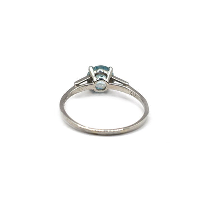Platinum Topaz and cubic zirconia ring featuring a sparkling gemstone and elegant band design.