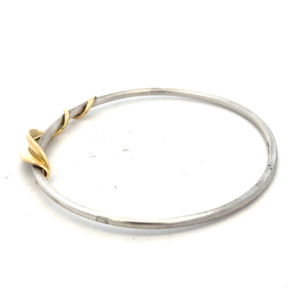 Silver bracelet bangle weighing 13.3g, unbranded, with a smooth, shiny finish and simple circular design.
