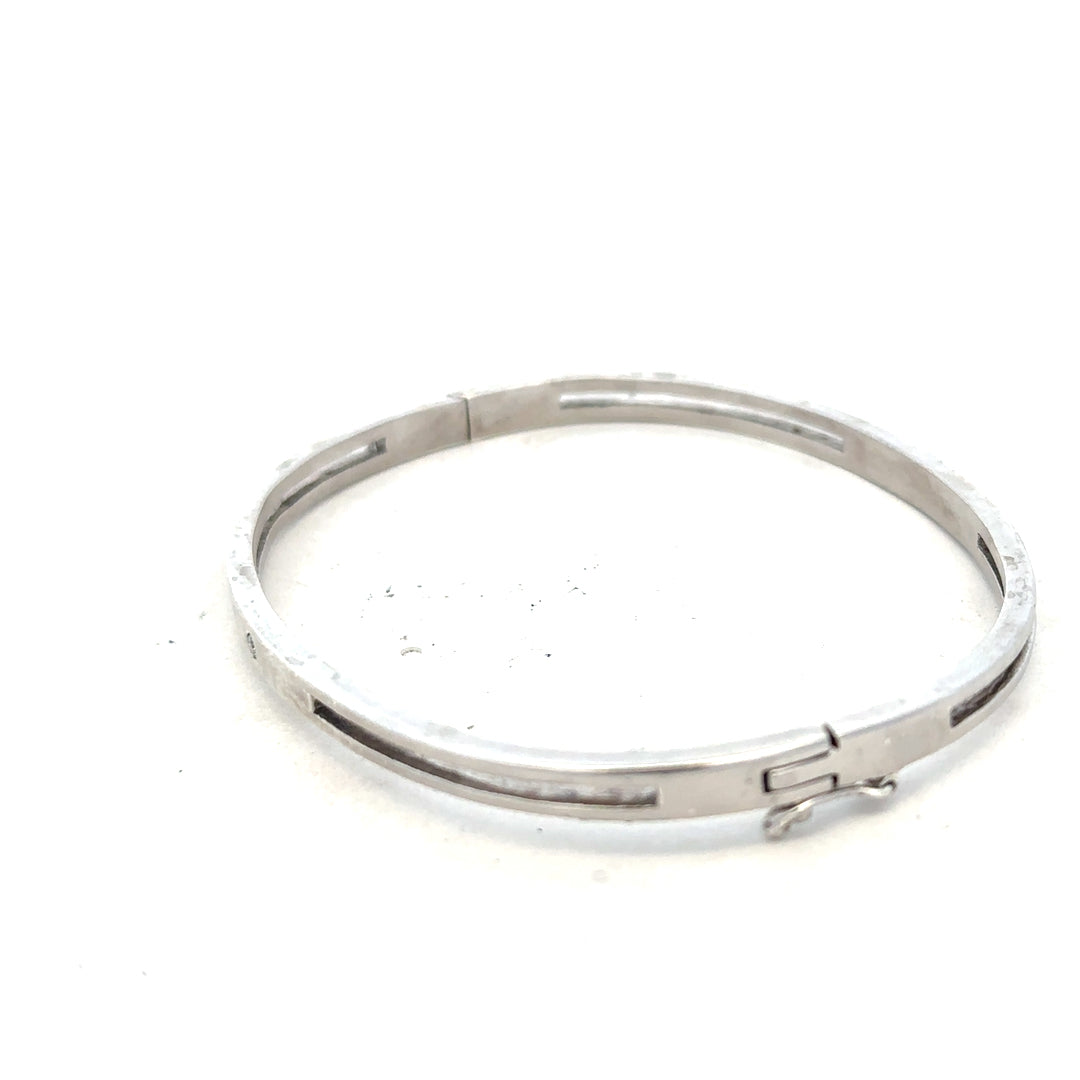 Silver bracelet bangle weighing 13.5g with a sleek, polished finish, featuring a simple unbranded design.