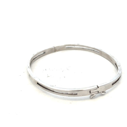 Silver bracelet bangle weighing 13.5g with a sleek, polished finish, featuring a simple unbranded design.