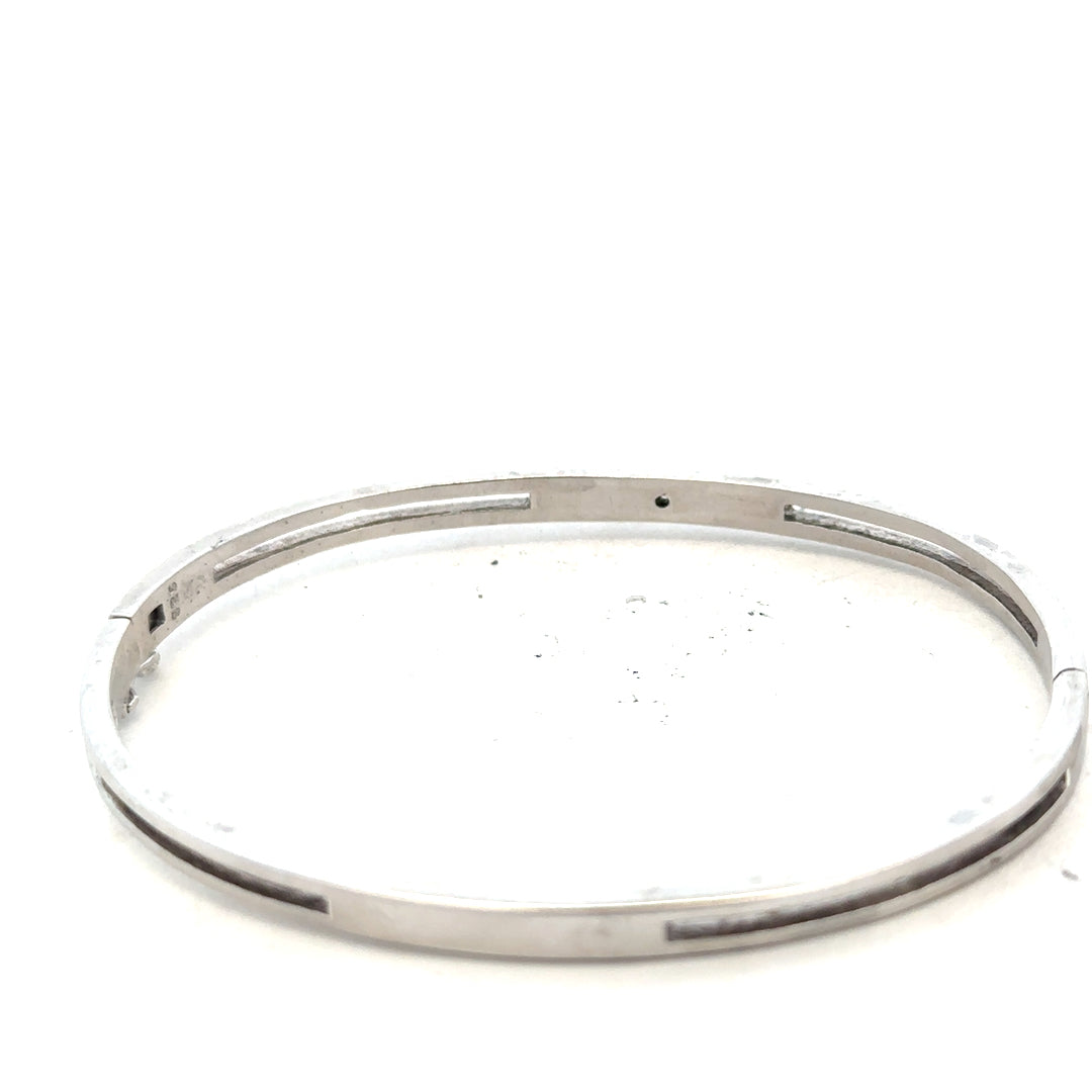 Silver bracelet bangle weighing 13.5g, unbranded, with a sleek, minimalist design, shown on a plain background.